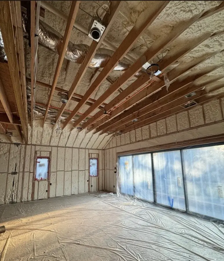 Interior walls and ceiling insulated with spray foam during new construction in Uwchlan